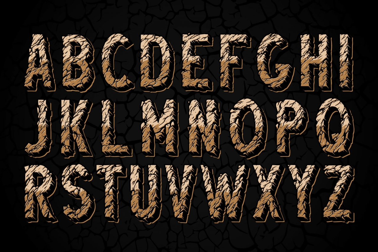 Desert rock display font family alphabet with damaged rock effect