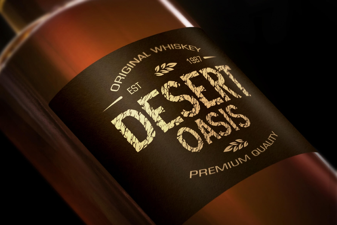 Label design with desert rock font as a headline on a whiskey bottle mockup