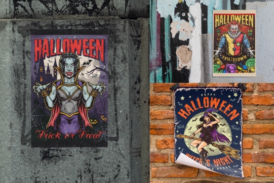 Different Halloween posters on poster mockups